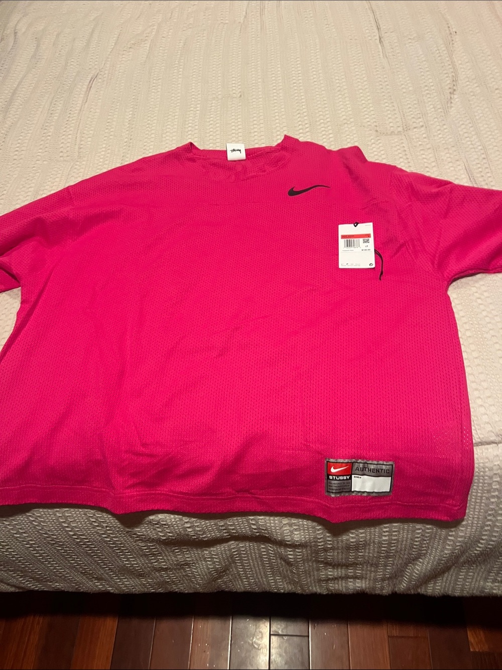 Nike Men’s Hot Pink Short Sleeve Mesh Tee with Black Swoosh Accent